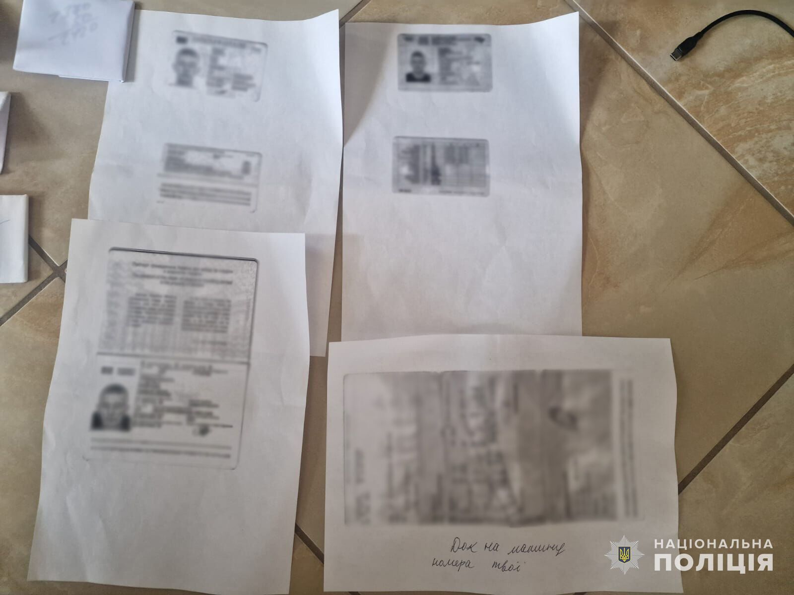 Понад 300 печаток, зброя та мільйони гривень: як працювала фабрика фальшивих документів