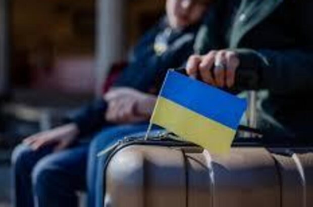 Повернення українців з-за кордону: НБУ прогнозує першу хвилю у 2027 році